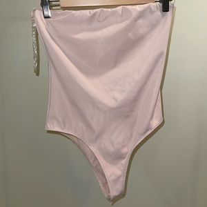 Nude strapless bodysuit. Size small.